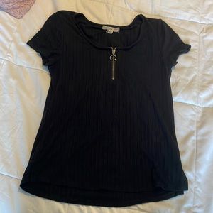 A black T-shirt with a zipper